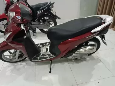 Honda Vision red black motorbike