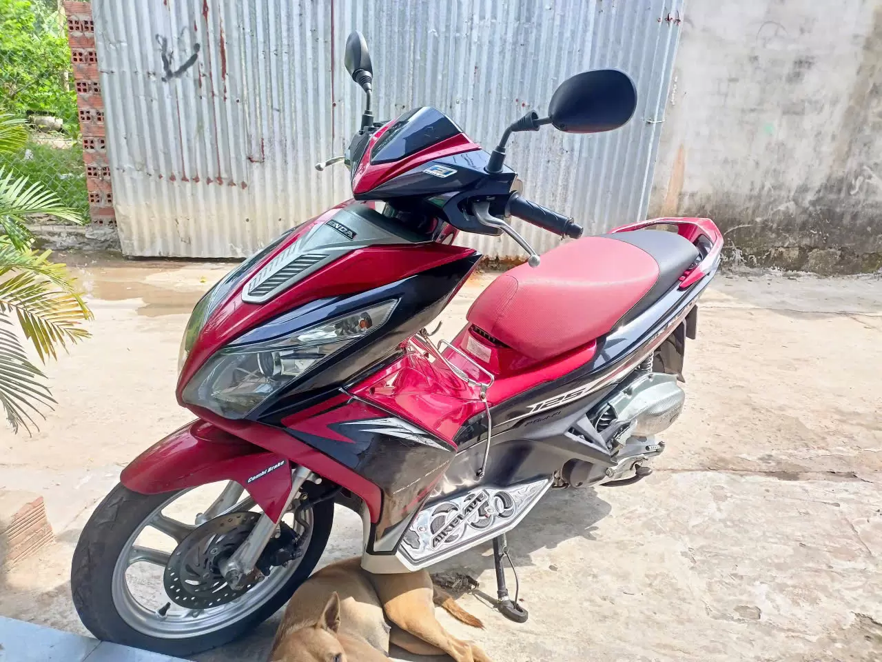 Honda Air Blade black and red motorbike