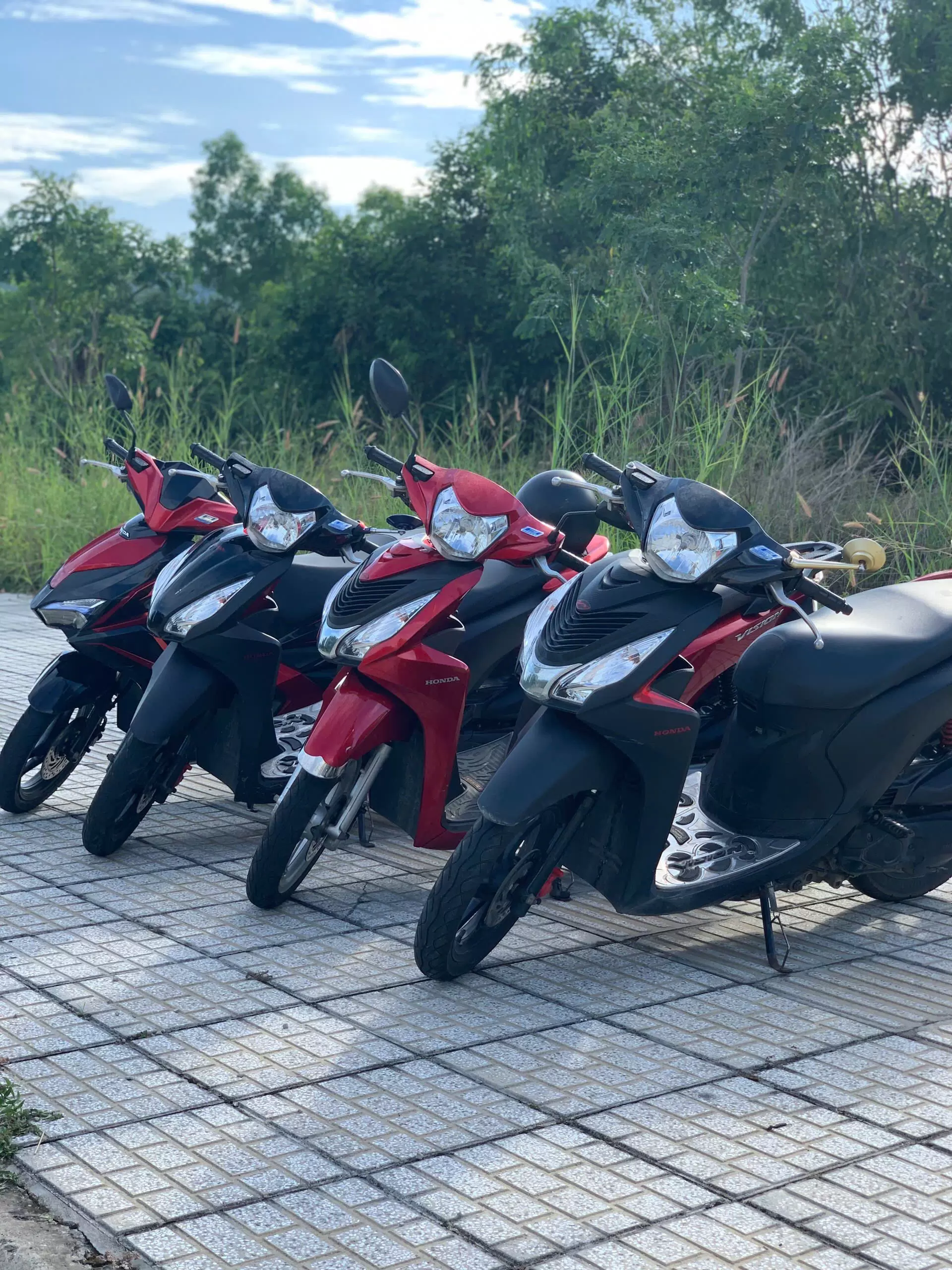 Honda Vision motorbike black, red