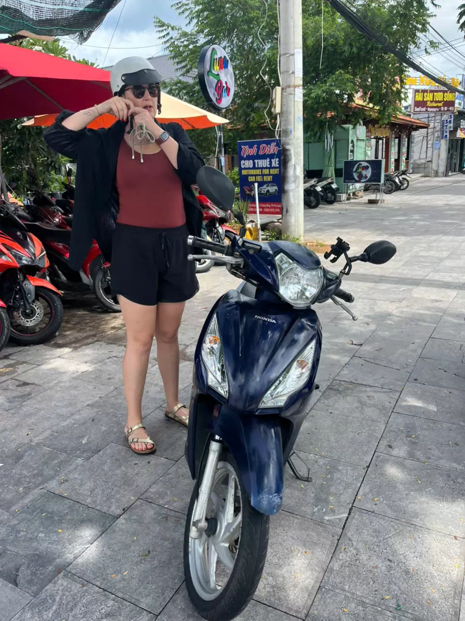 Honda Vision motorbike charcoal blue