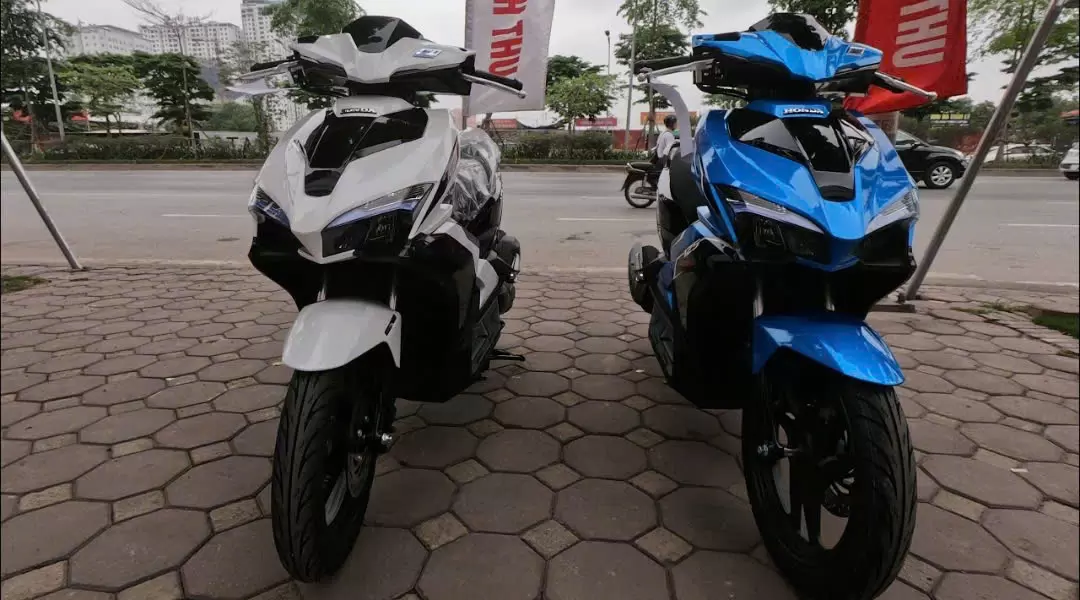 Honda Air Blade white and blue motorbike