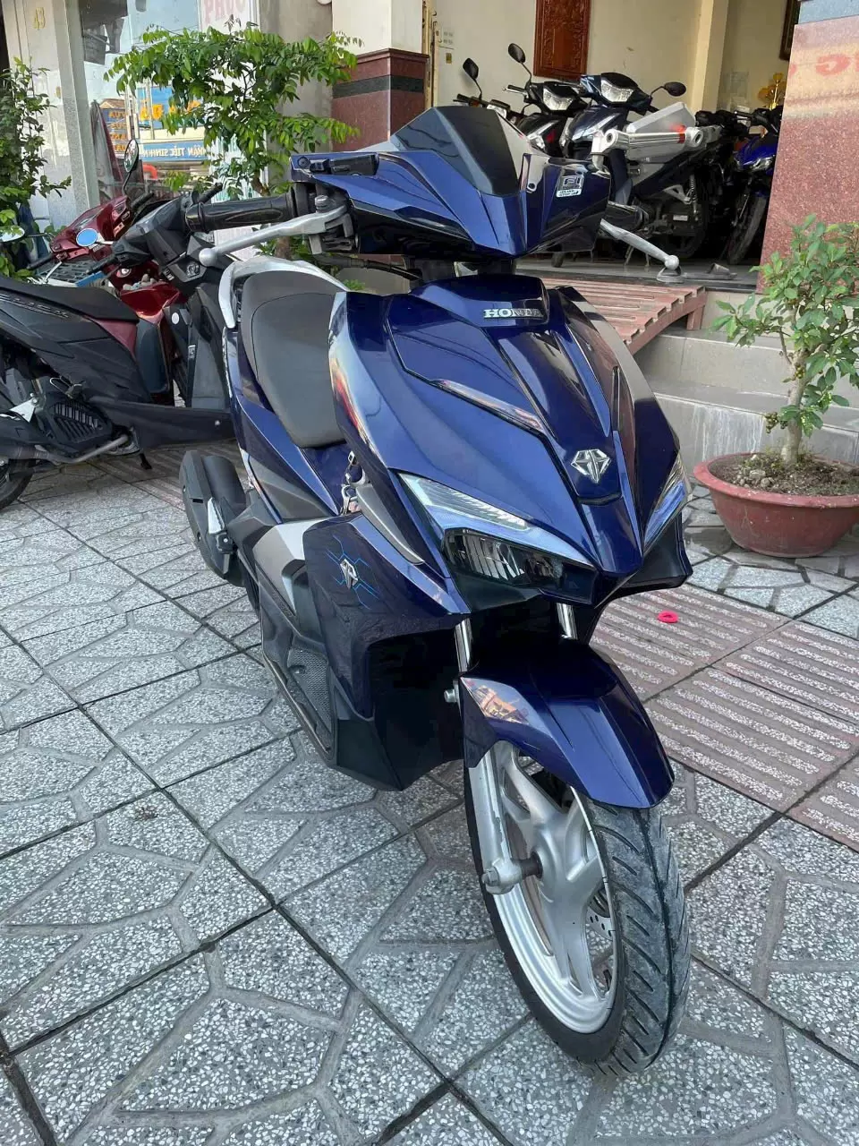 Honda Air Blade motorbike in charcoal blue